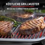 Bistecche grigliate sulla griglia elettrica Weber Lumin Compact. Deliziosi segni di grigliatura.
