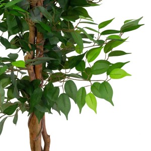 Dettaglio di una pianta artificiale con foglie verdi. Pianta finta decorativa per interni.
