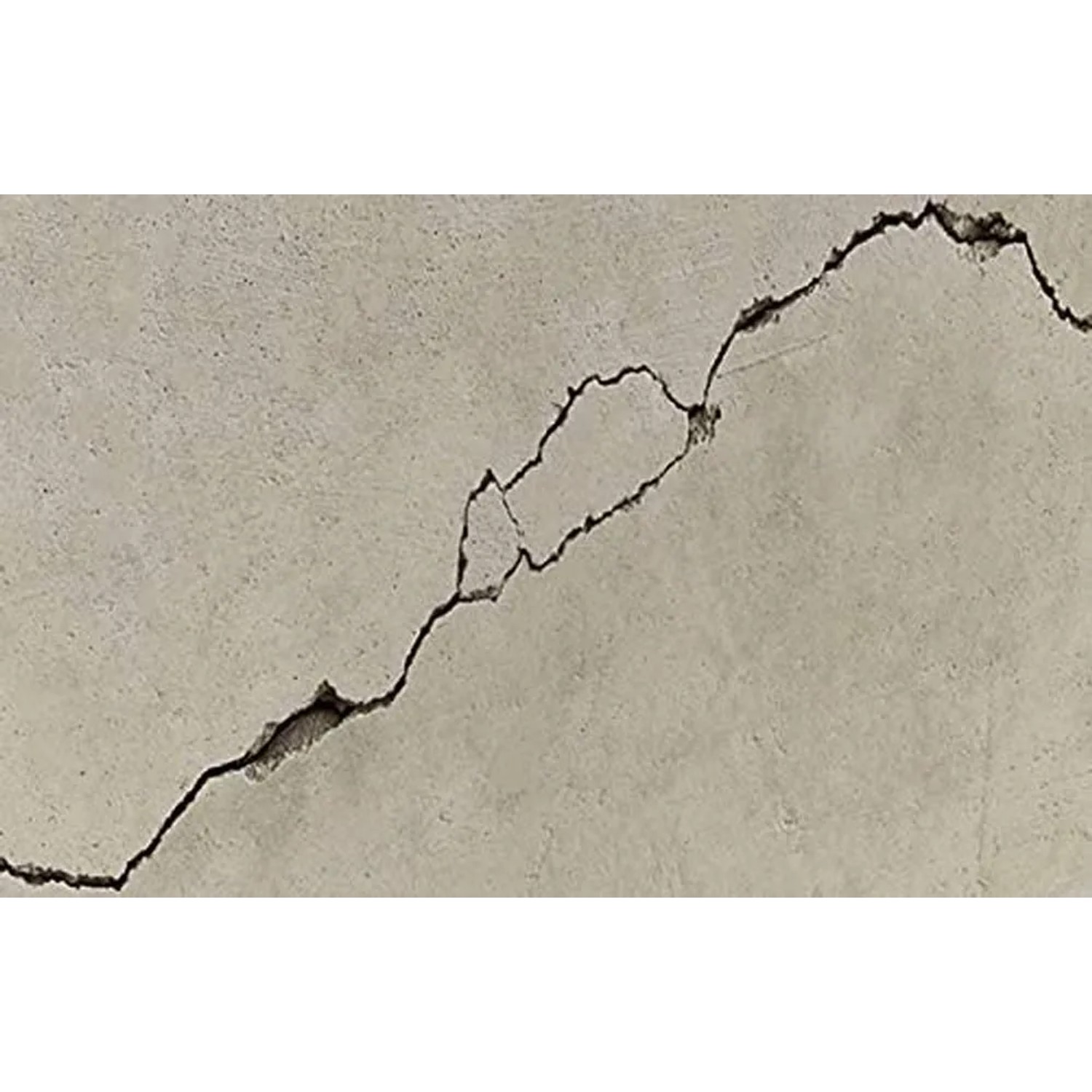 Crepa in un muro, riparata con stucco o stucco t.b.t.