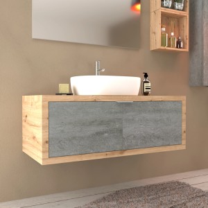 Mobile bagno t.b.t. con lavabo d'appoggio in un bagno moderno.