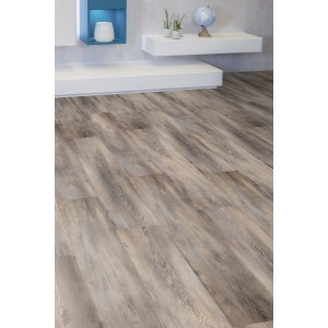 Pavimento laminato chiaro effetto legno per interni.