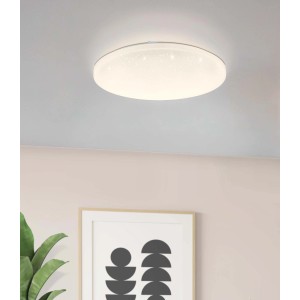Plafoniera LED rotonda e luminosa di t.b.t. con effetto stella sul soffitto.