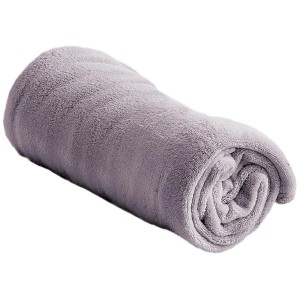 Coperta o plaid t.b.t. lilla arrotolata.